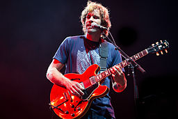 musician Jack Johnson playing guitar